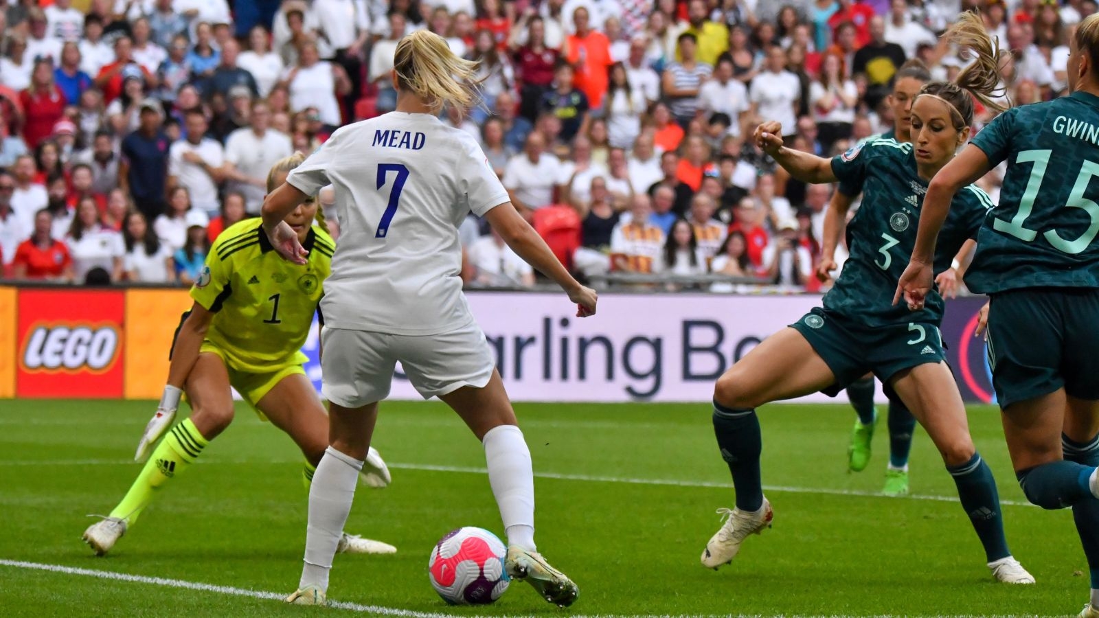 Beth Mead kicking ball in Number 7 shirt for England Women's football