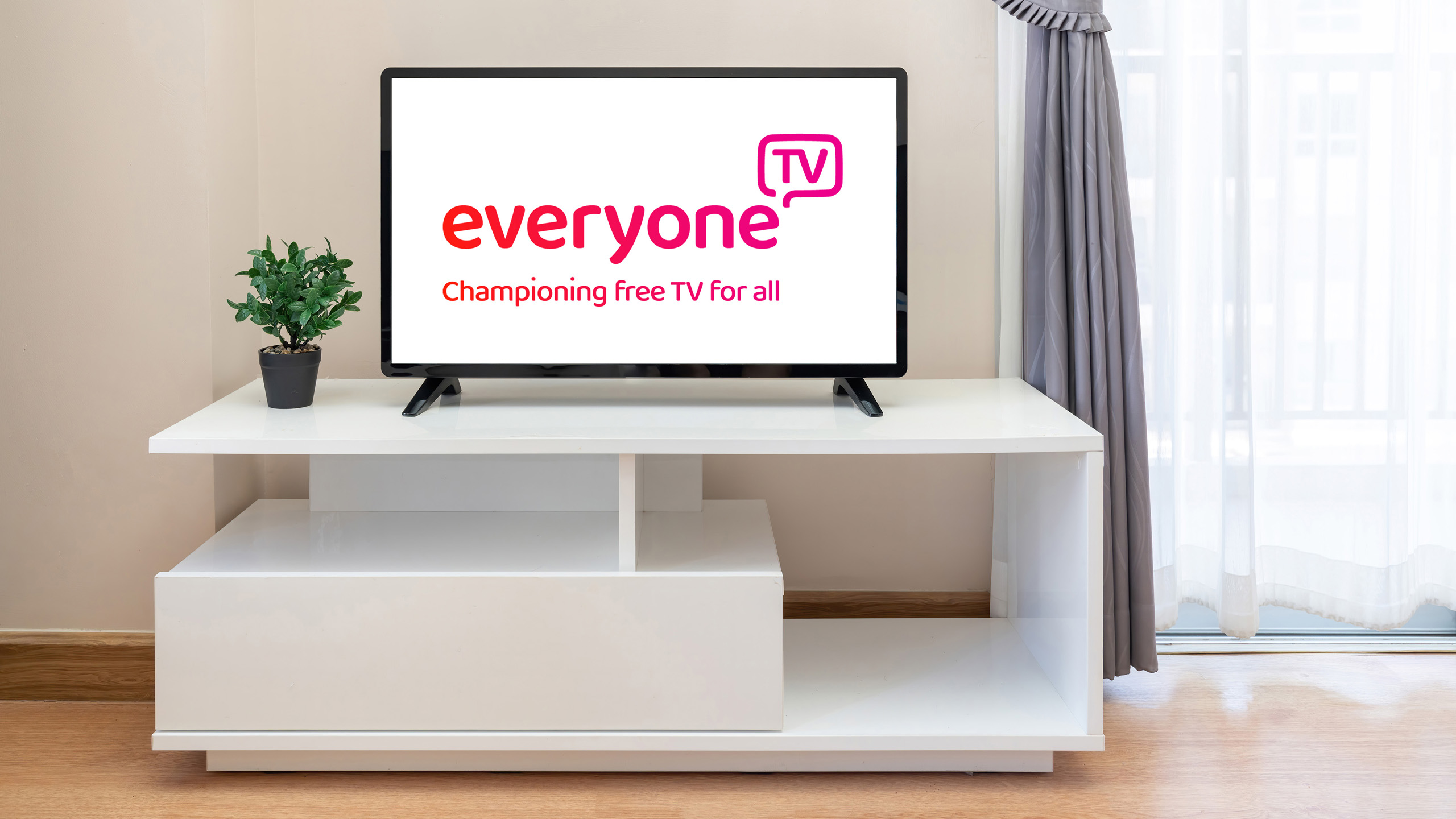 TV screen displaying message "Championing Free TV for all"