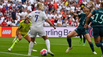 Beth Mead kicking ball in Number 7 shirt for England Women's football